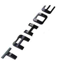 Generic Tahoe emblems side view showing compact size for a seamless fit.
