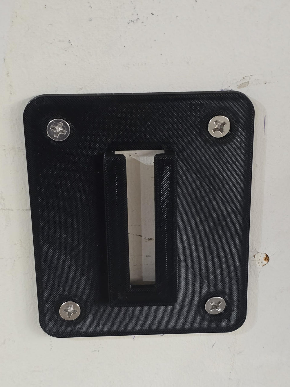 Generic wall-mount installation on wall shows simple setup.