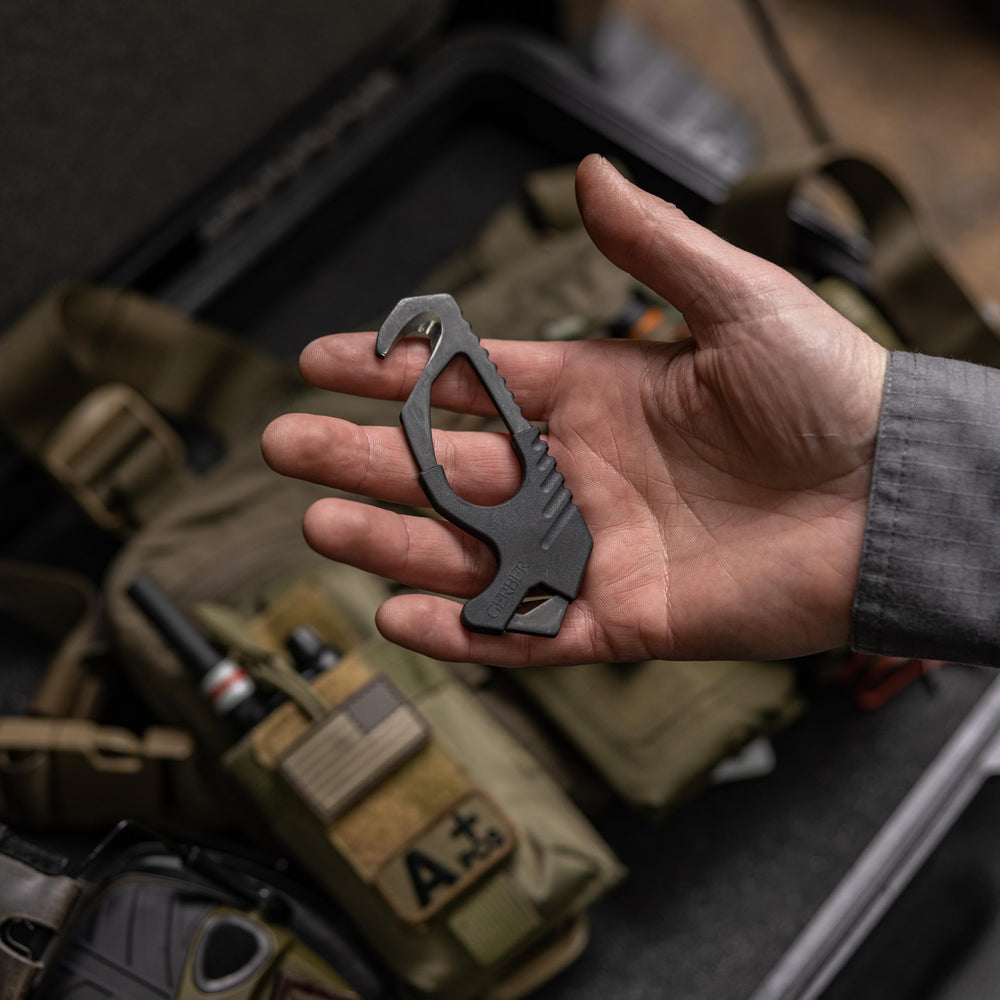 Gerber seatbelt cutter 420HC steel build ensures reliable edge performance.