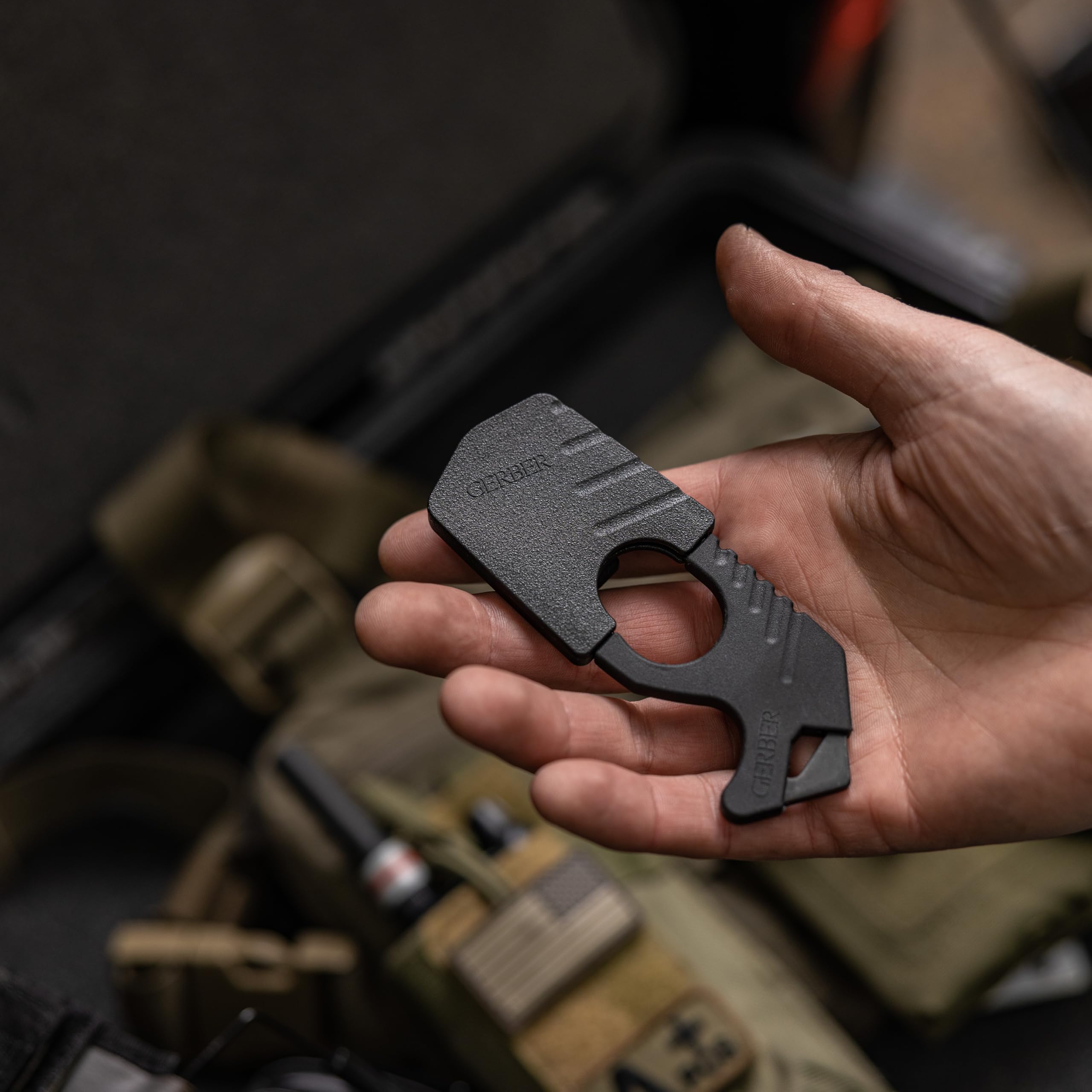 Gerber seatbelt cutter in-car storage demonstrates readiness.