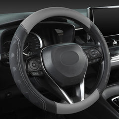 Giant Panda steering wheel cover closeup shows premium leather texture for better grip.