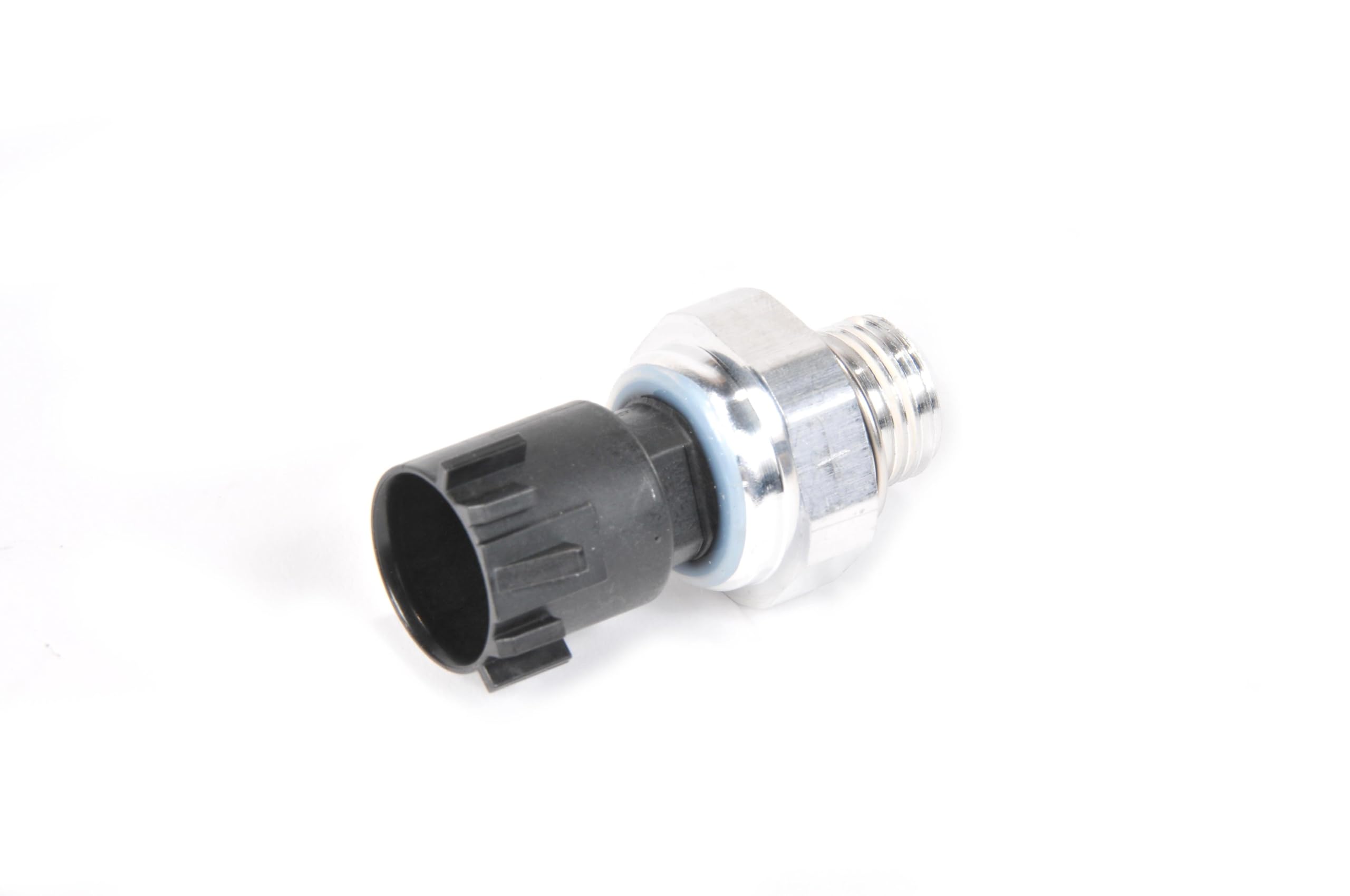 GM Genuine Parts engine oil pressure sensor closeup for reliable readings.