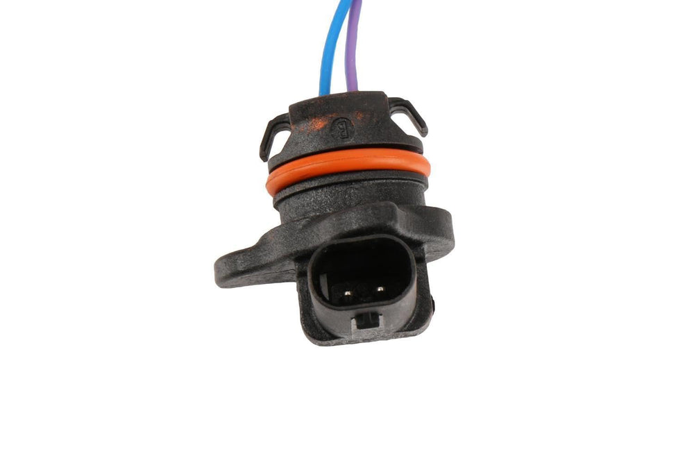 GM Genuine Parts 12681015 closeup of connector on oil pump flow control solenoid wire for secure installation