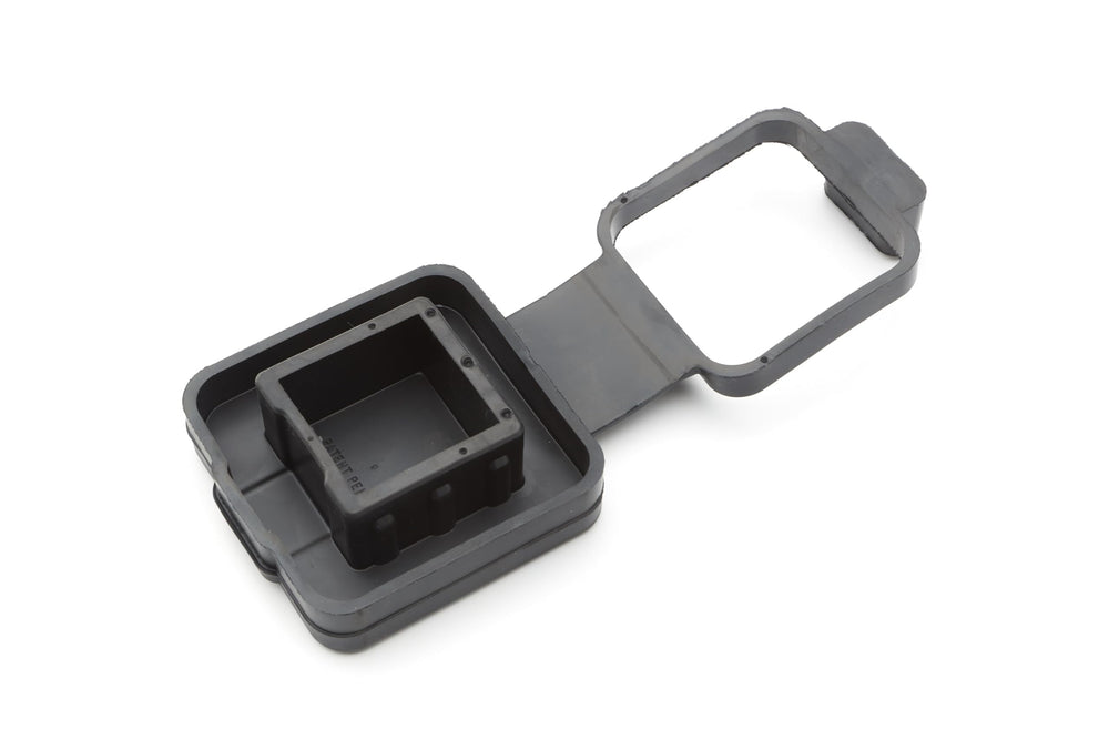GM Genuine Parts trailer hitch closeout with Bowtie logo protects the receiver from debris.