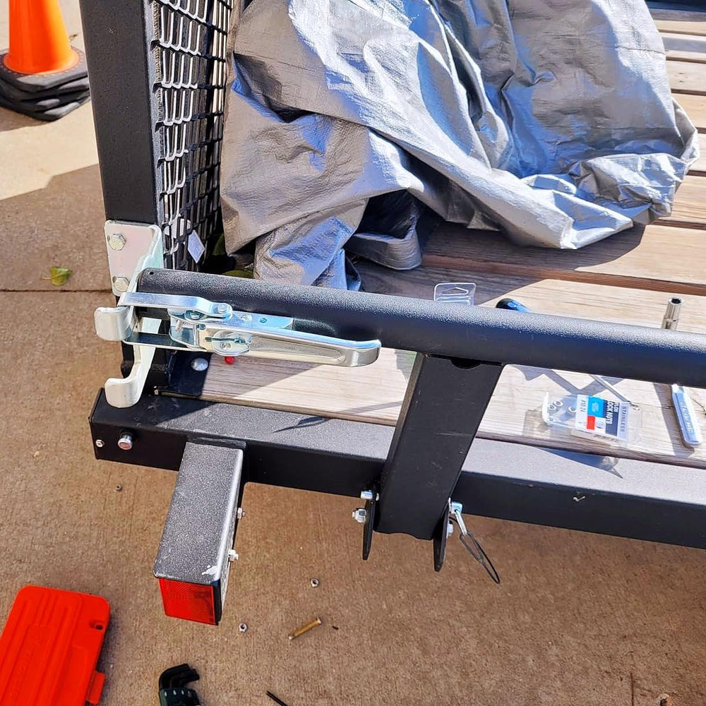 GMKD spring-loaded safety latch provides secure attachment during travel.