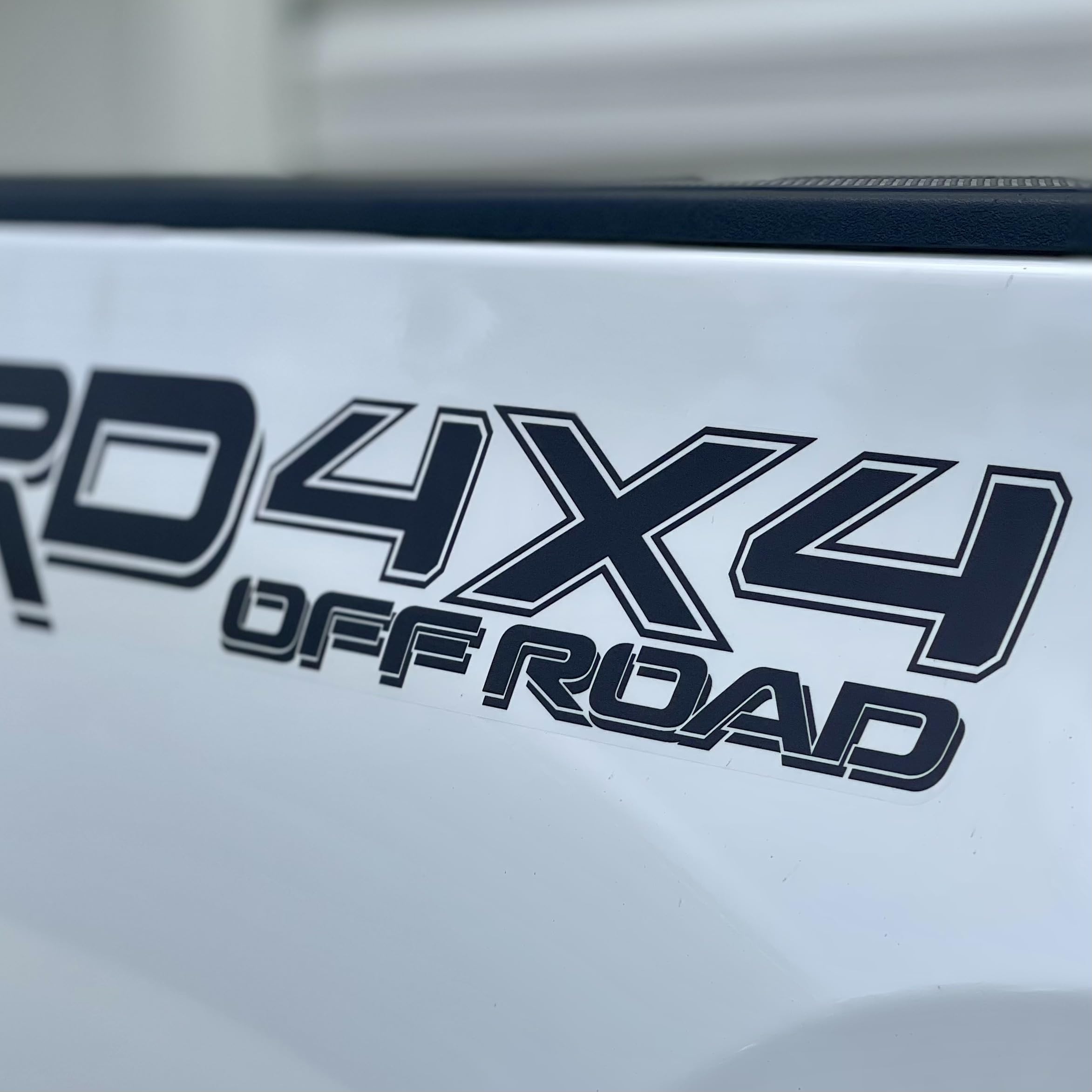 GO-GO.GROUP 4x4 offroad bedside decal closeup highlights bold matte black letters