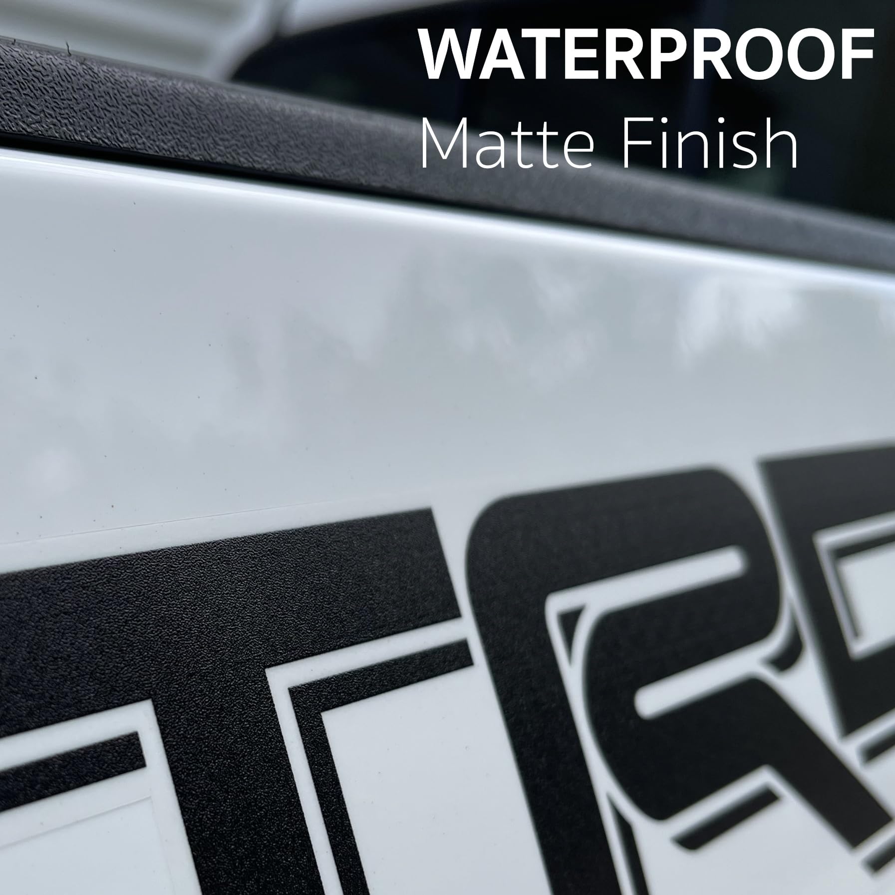 GO-GO.GROUP matte black on clear gloss vinyl demonstrates seamless paint-through look