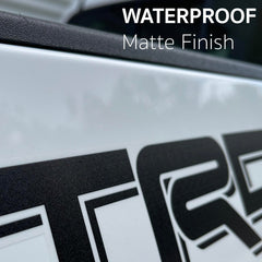 GO-GO.GROUP matte black on clear gloss vinyl demonstrates seamless paint-through look