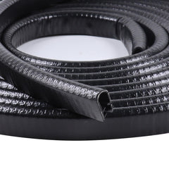 GoldWheel edge trim black U-channel with metal clip sealing car door edges.