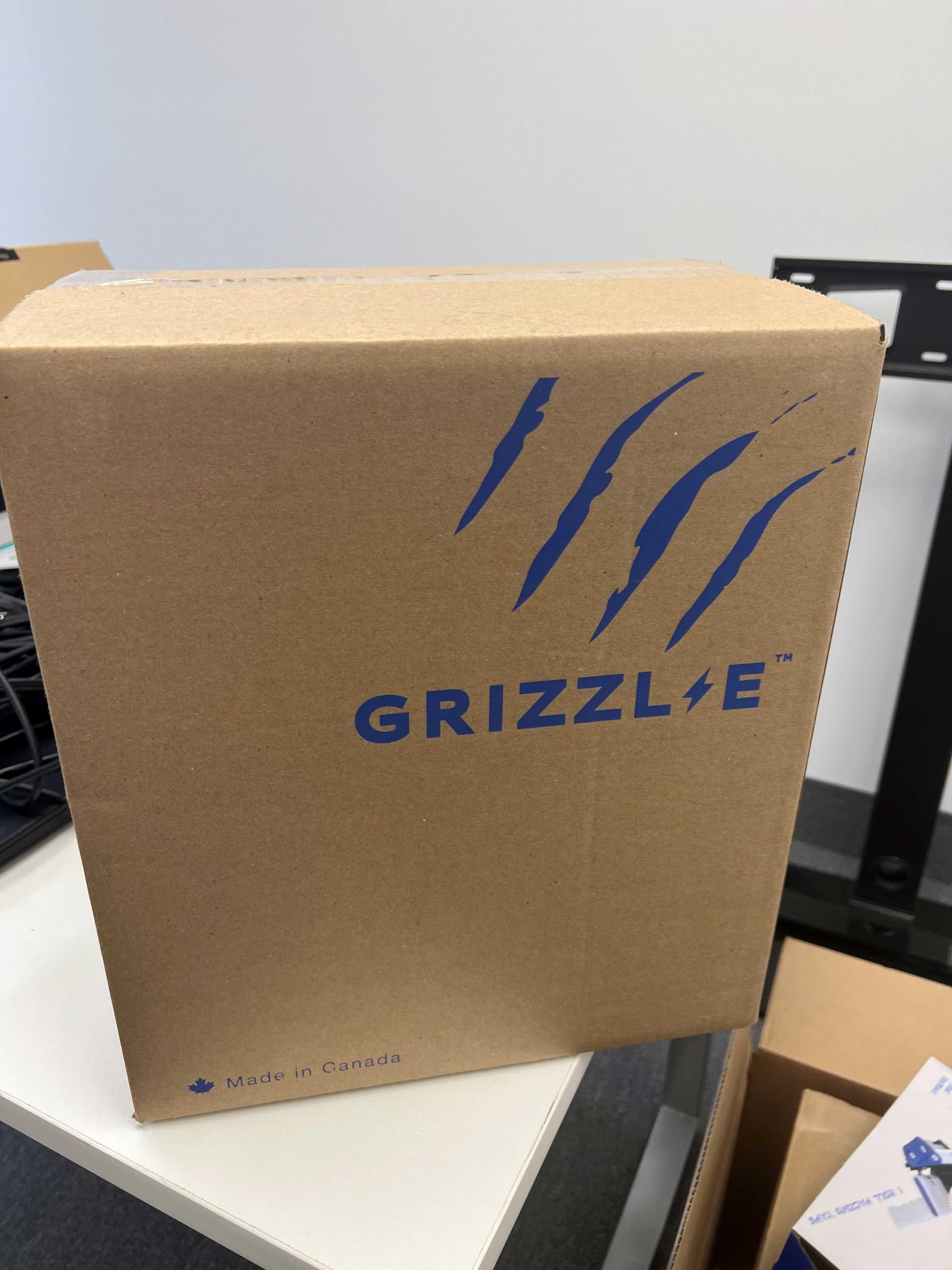 Grizzl-E Classic portable setup image highlights simple transfer between locations