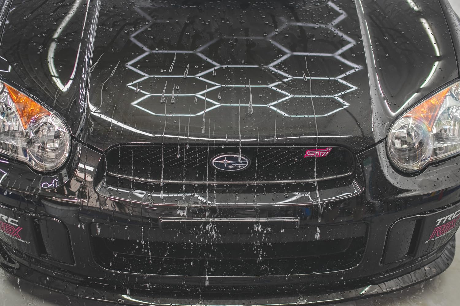 Gtechniq EXO glossy paint panel highlighting a high gloss finish
