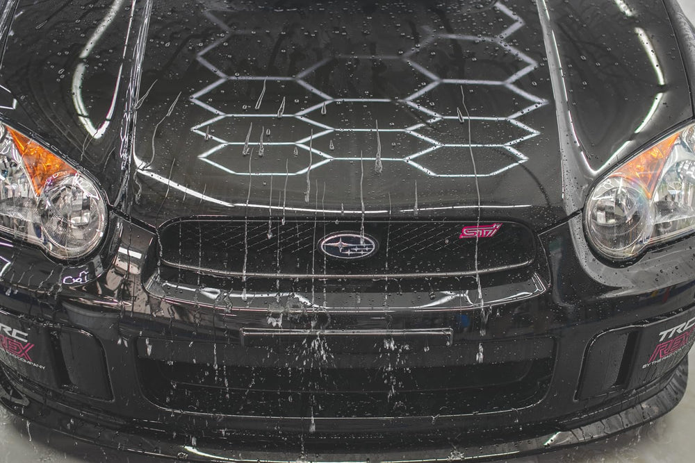 Gtechniq EXO glossy paint panel highlighting a high gloss finish