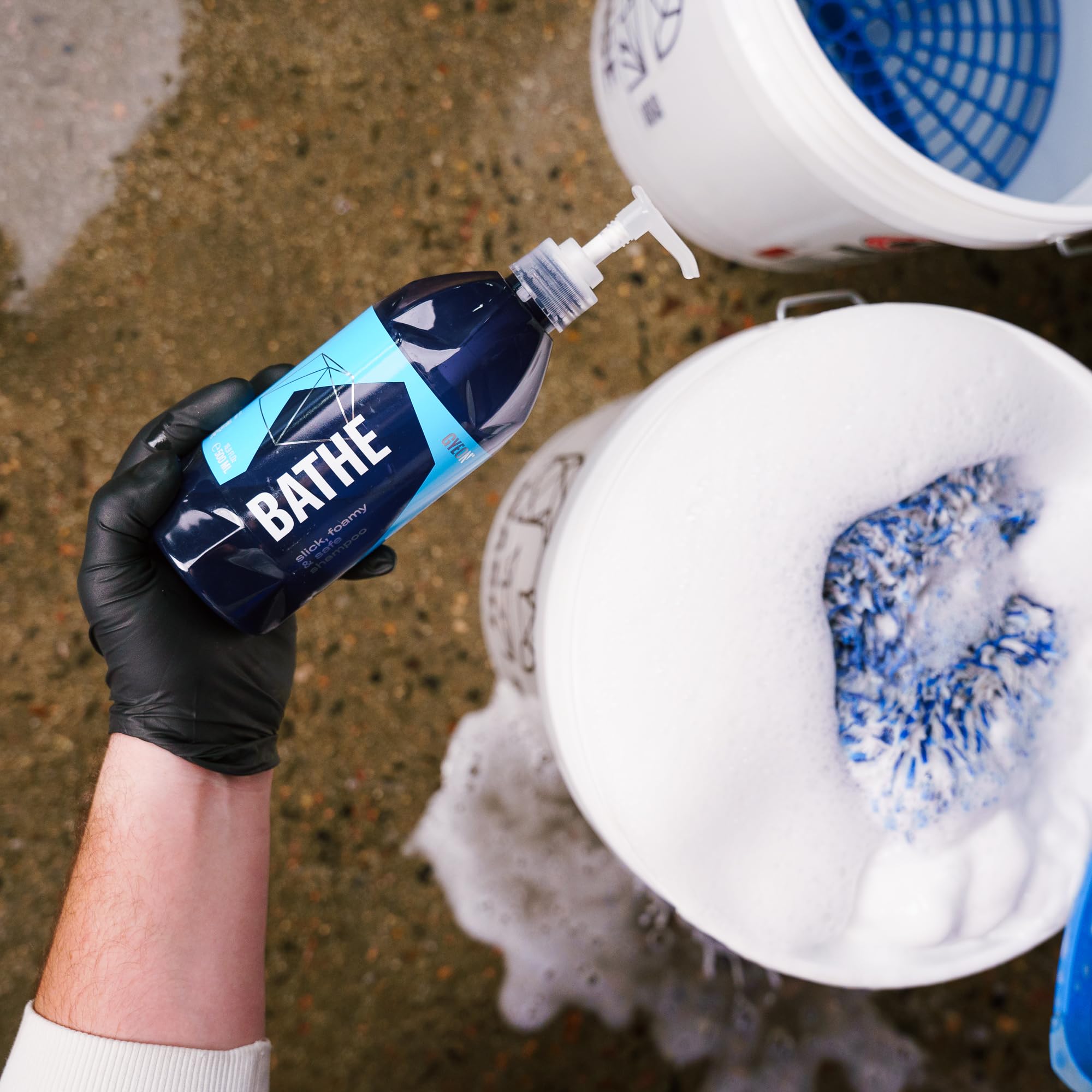 Gyeon Bathe safe-mitt-contact image highlights gentle washing with reduced swirl risk.