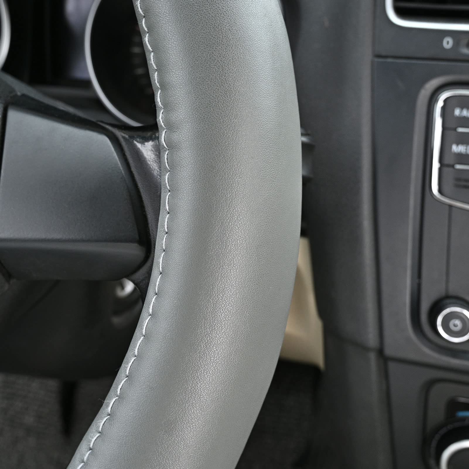 HAOKAY universal-fit steering wheel cover on 14.5-15 inch wheels supports better control and protection.