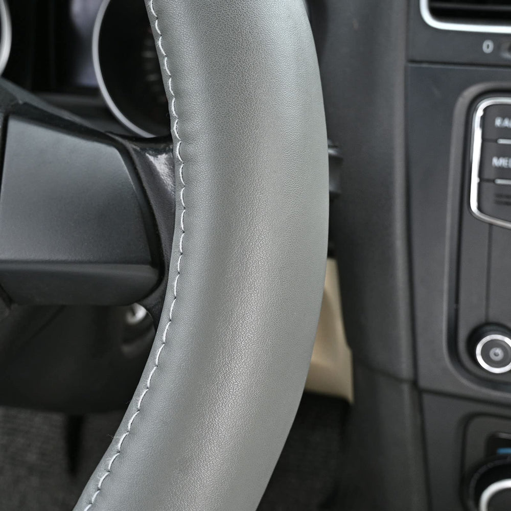 HAOKAY universal-fit steering wheel cover on 14.5-15 inch wheels supports better control and protection.