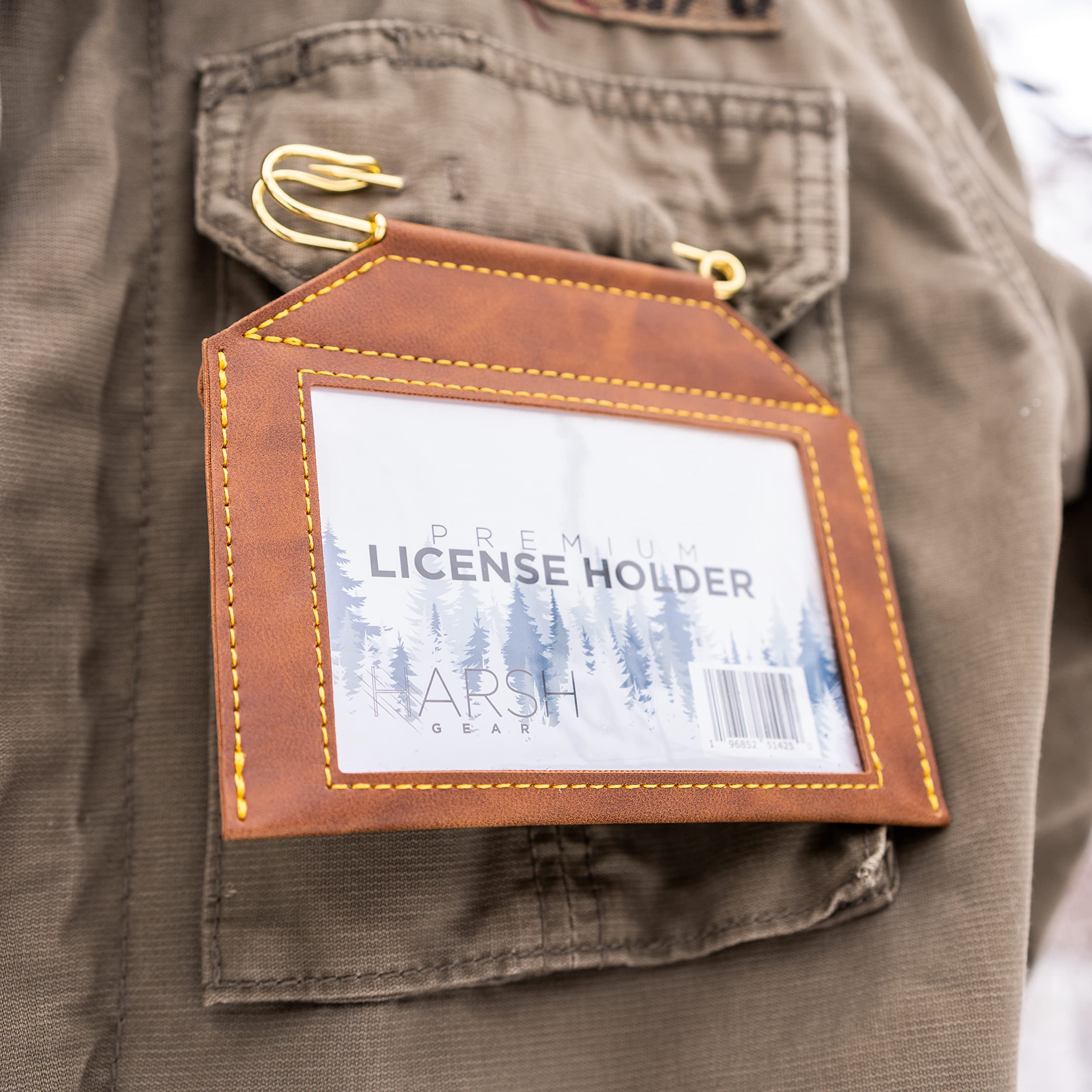 Harsh Gear license holder worn on vest during outdoor activities.