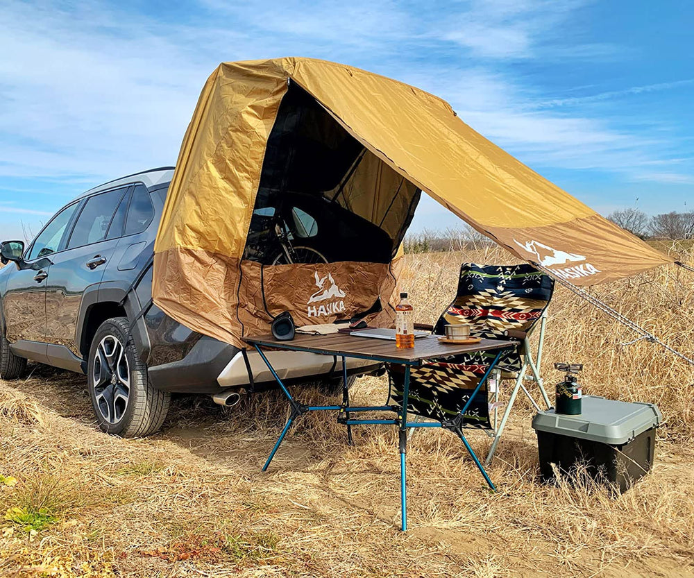 Hasika tailgate tent blocks rain and sun for gear protection