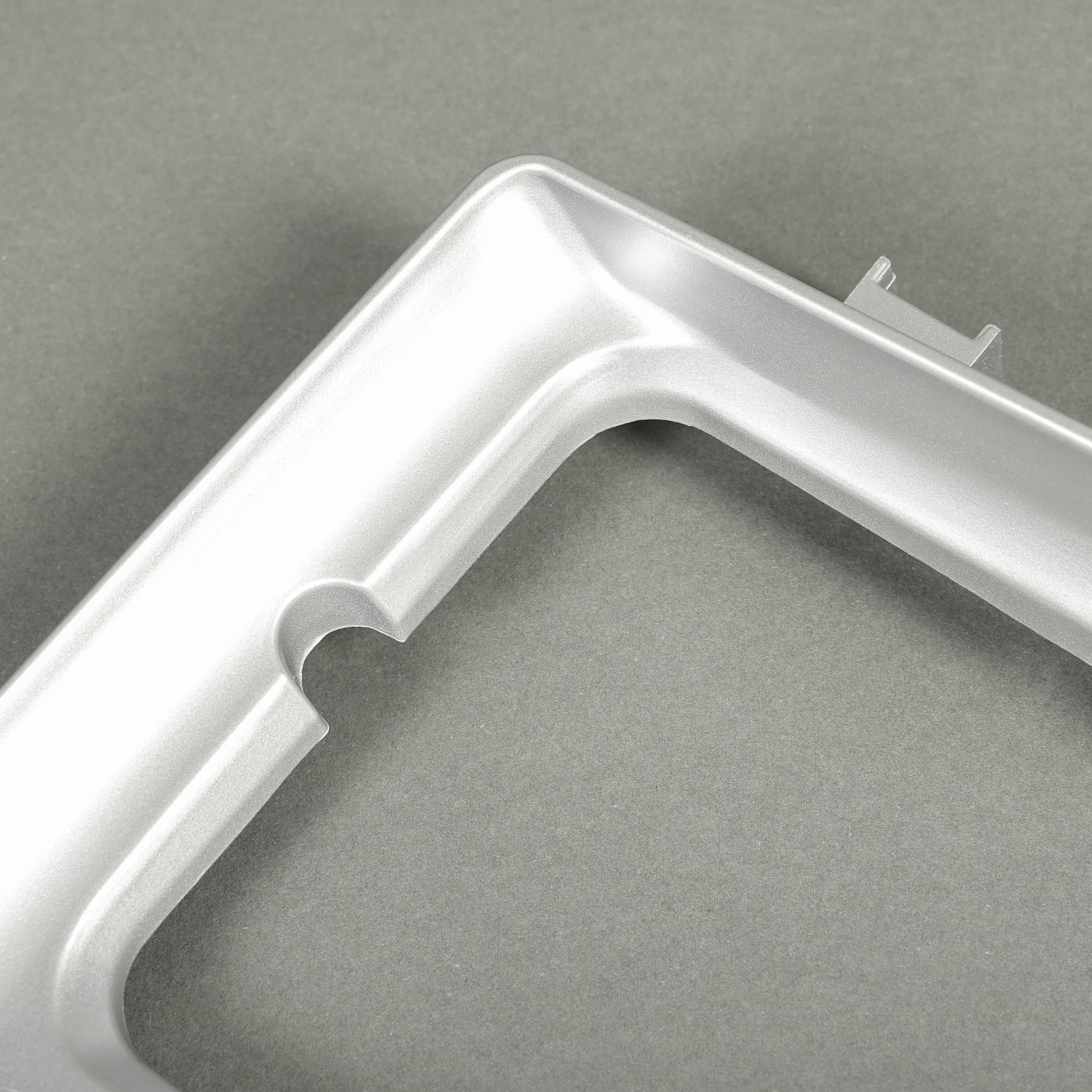 Durable ABS construction highlighted in HECASA headlight bezel close-up.