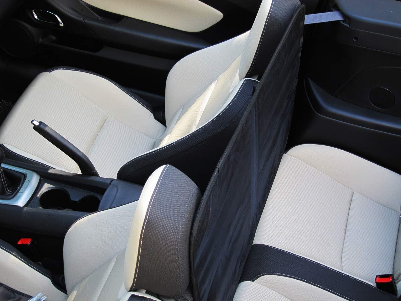 HÖLM windscreen deflector folds compactly for trunk storage.
