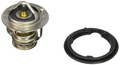 The Honda 19301-PAA-306 thermostat on a workbench for reliable engine cooling.