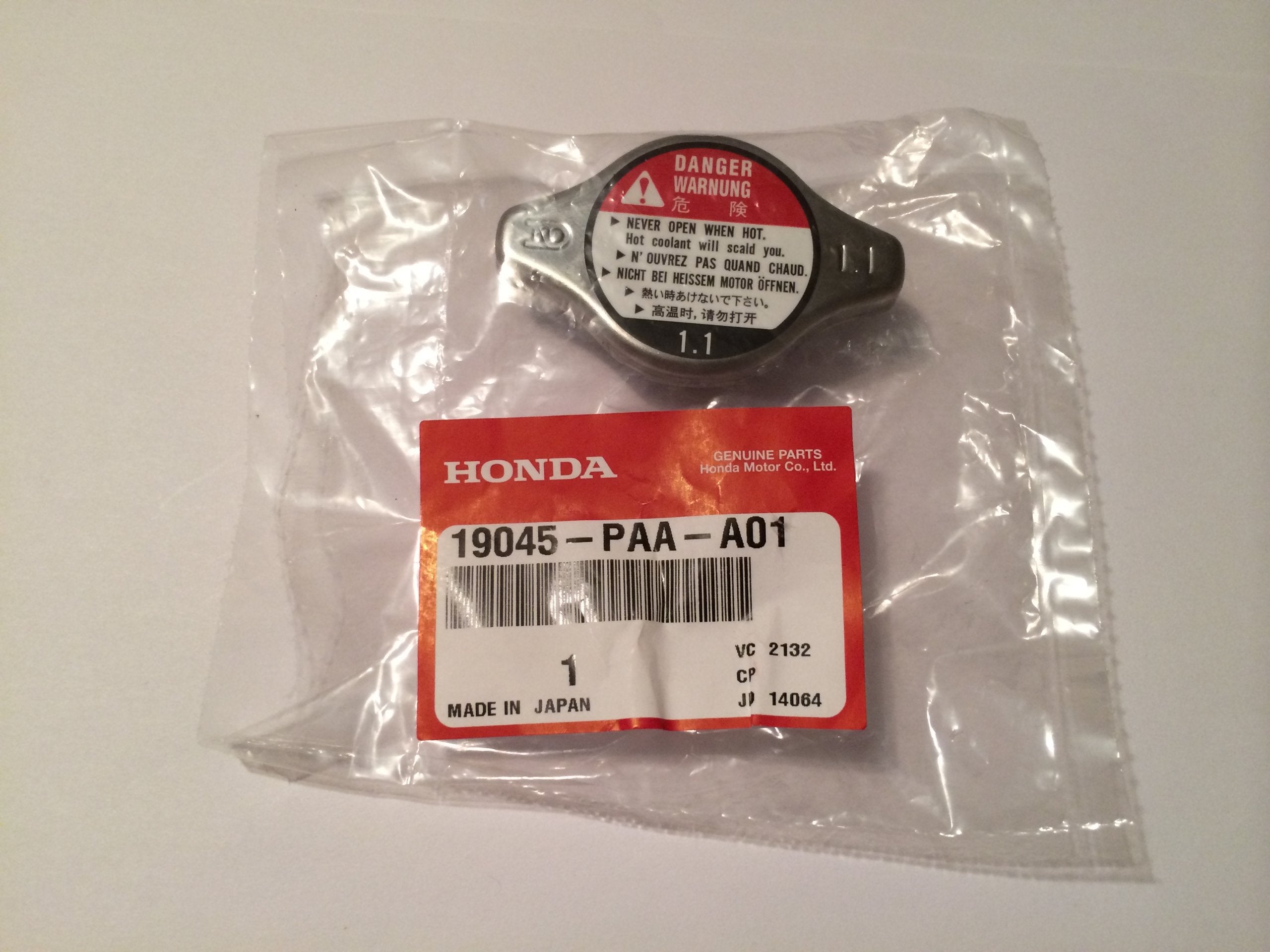 Close-up of Honda radiator cap gasket area highlighting durable seal under pressure.