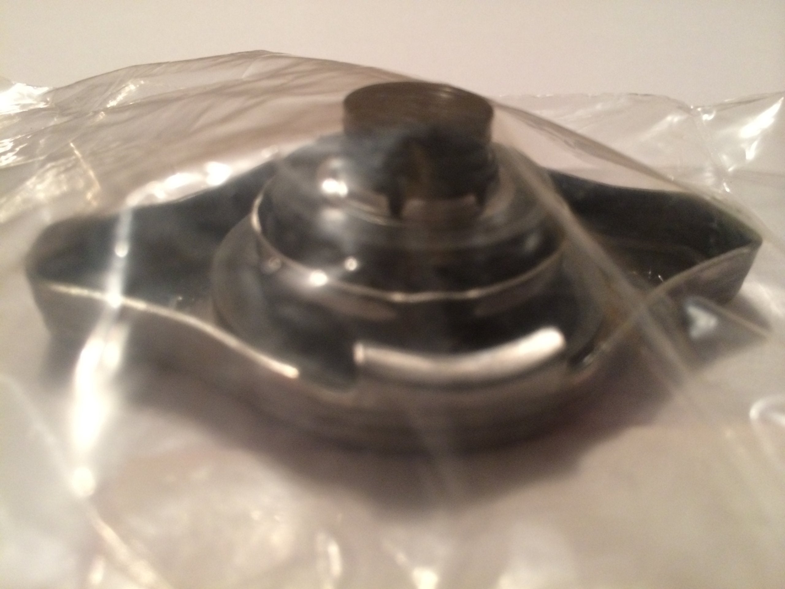 Honda radiator cap in boat engine context for watercraft cooling.