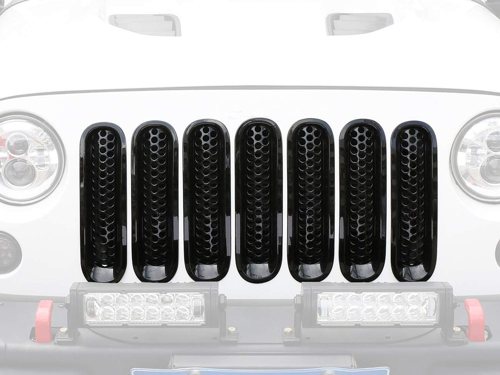 Hooke Road Wrangler JK gloss black grille inserts elevate exterior styling and cohesion.
