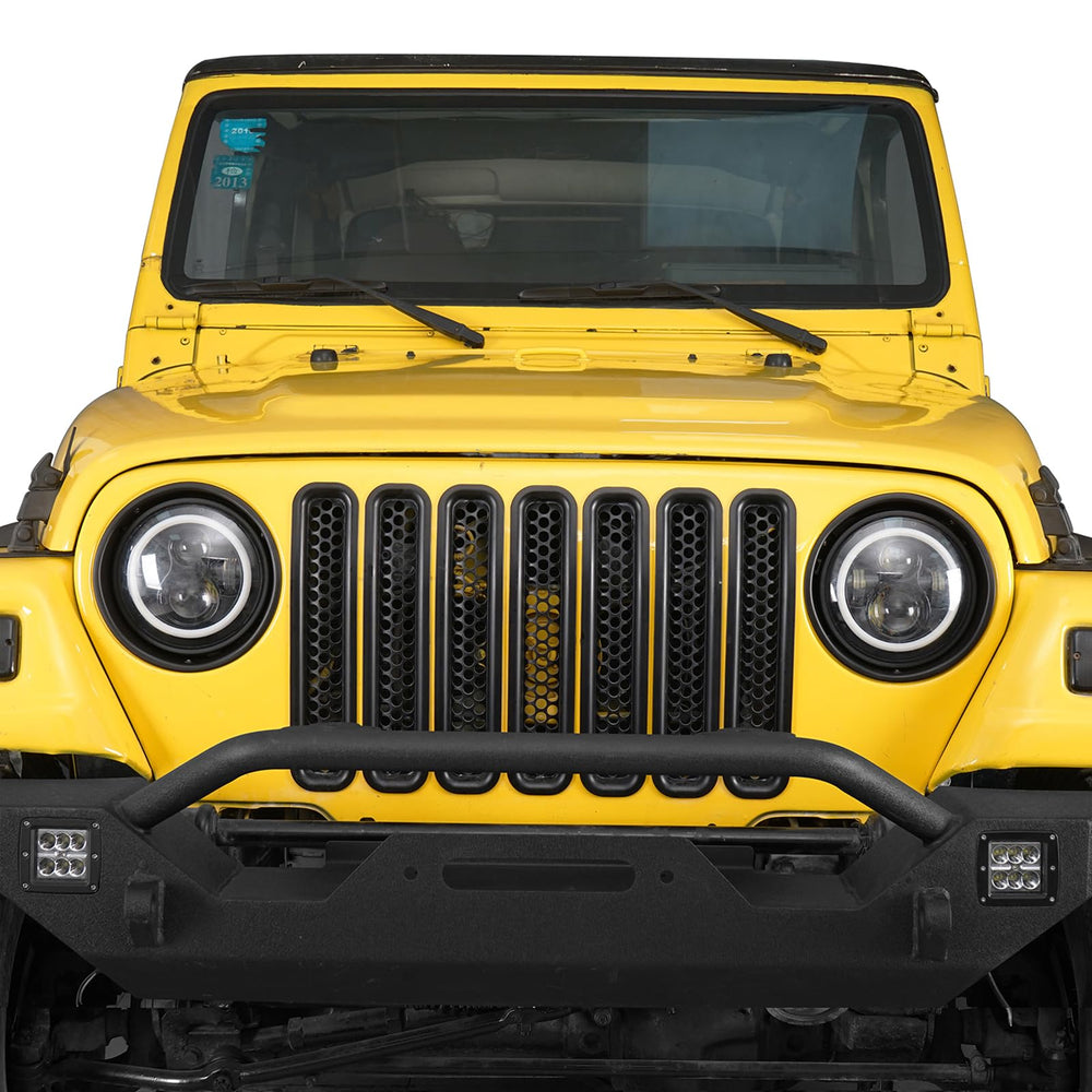 Front view of Wrangler TJ with matte black bezels for off-road appeal.