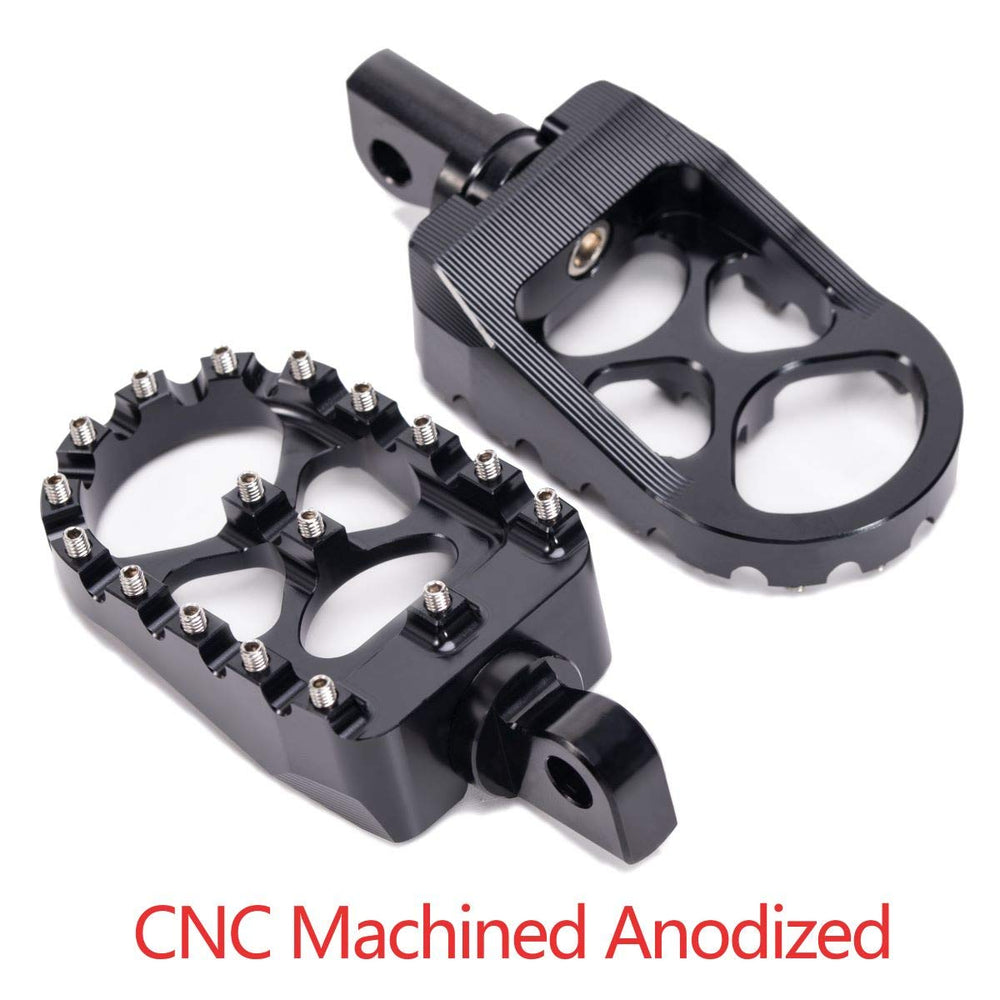 Hopider wide foot pegs on Harley Dyna showing 360° rotation for comfort.