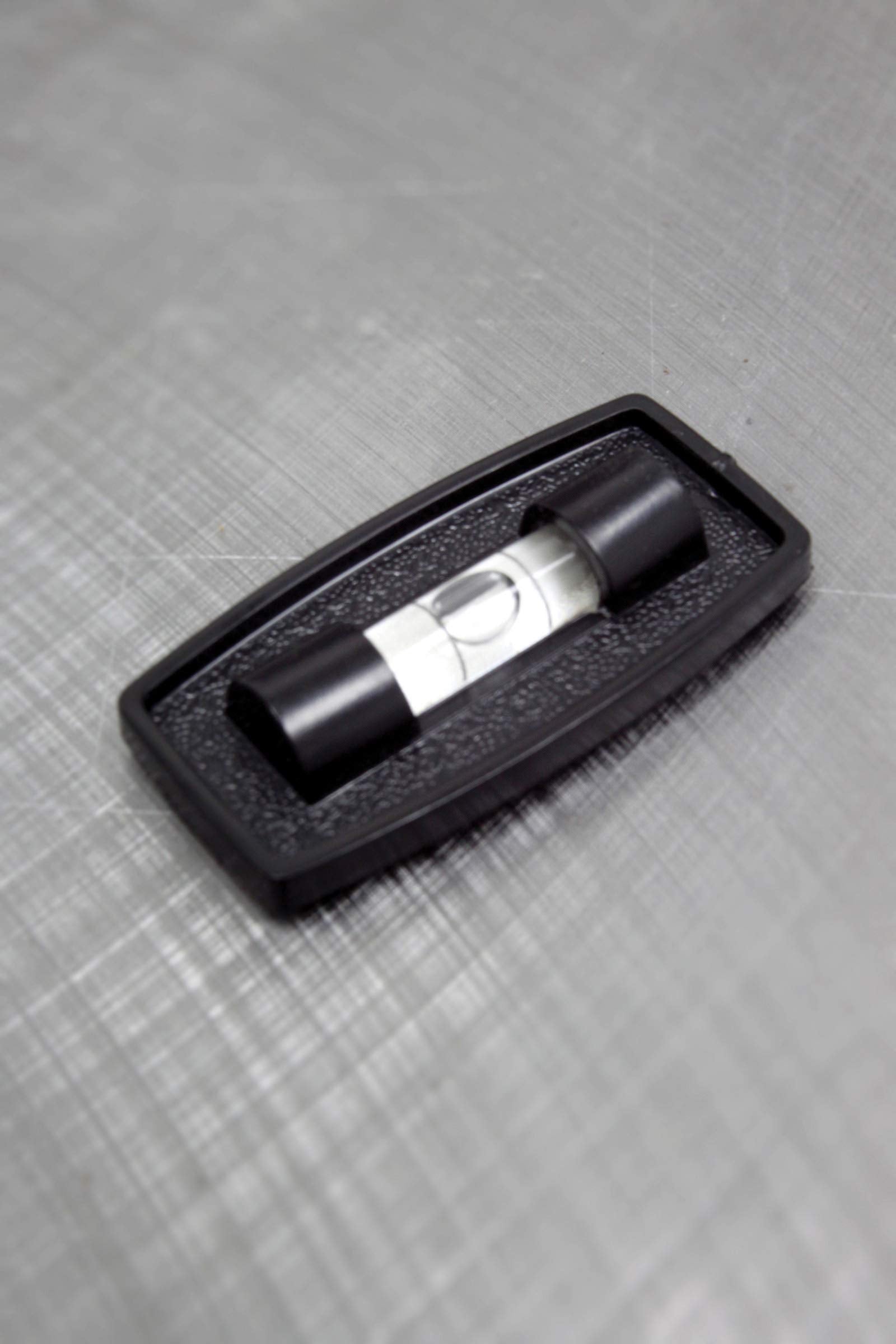 Compact, self-adhesive level ideal for quick mounting by Hopkins