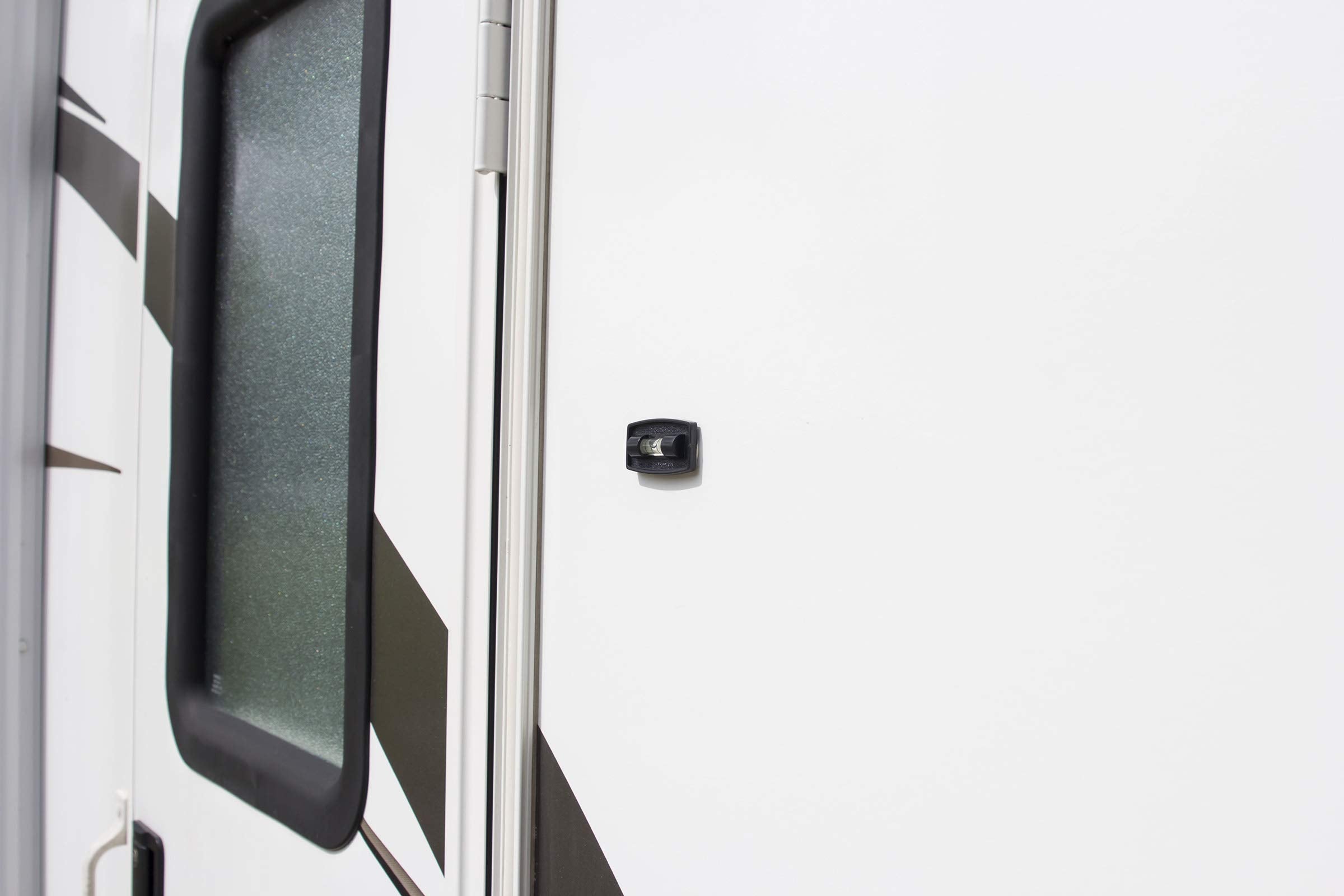 Two-way indicators visible on a frame, appliance, or shop gear