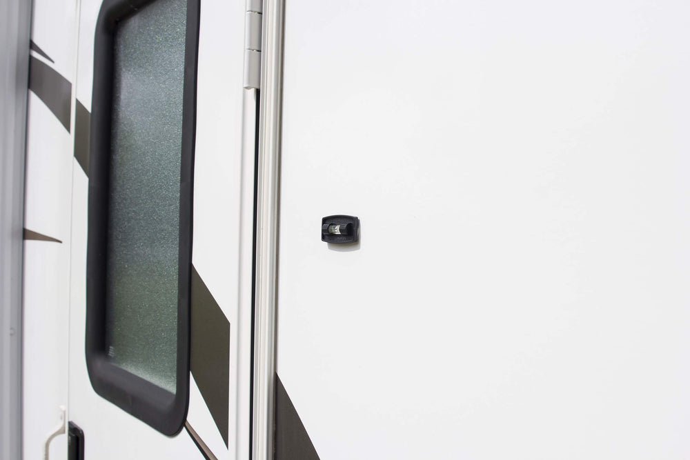 Two-way indicators visible on a frame, appliance, or shop gear