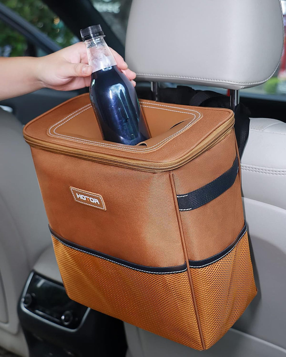 HOTOR car trash can interior with adjustable straps keeping it secure