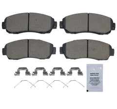HUSCH D1521 front pads close-up highlighting slots and chamfers for noise reduction