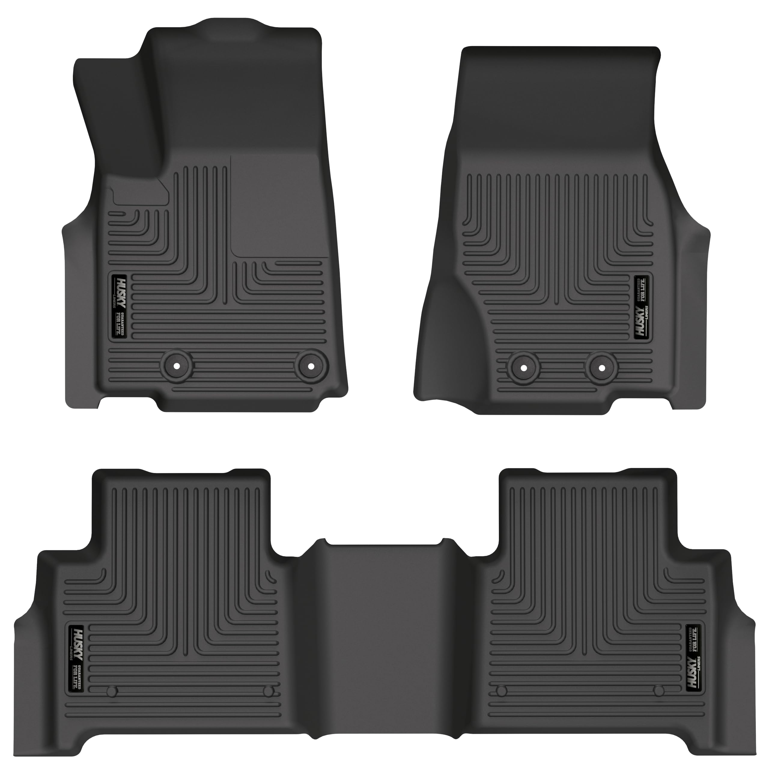 Husky Liners WeatherBeater front-row mats on a Jeep Grand Cherokee showing edge-to-edge protection