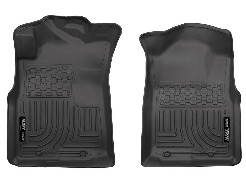 Husky Liners WeatherBeater front-row Tacoma mats with laser-tight fit for edge-to-edge protection.
