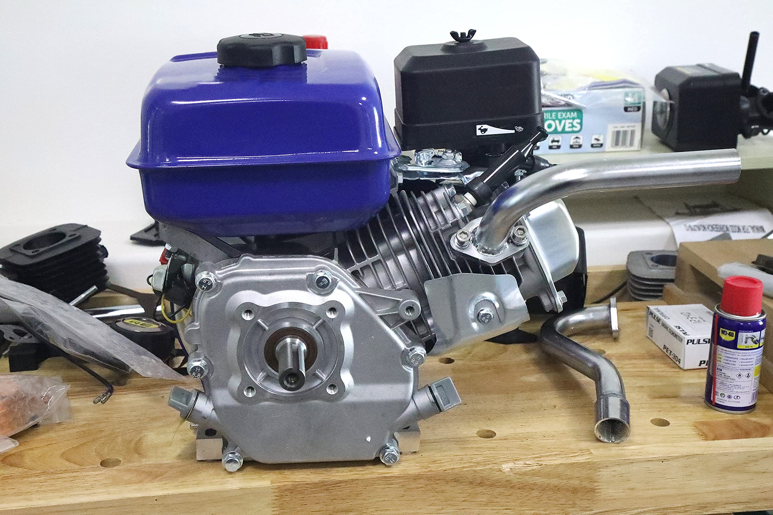 Close-up of Predator 212cc fitment showing enhanced exhaust flow potential.