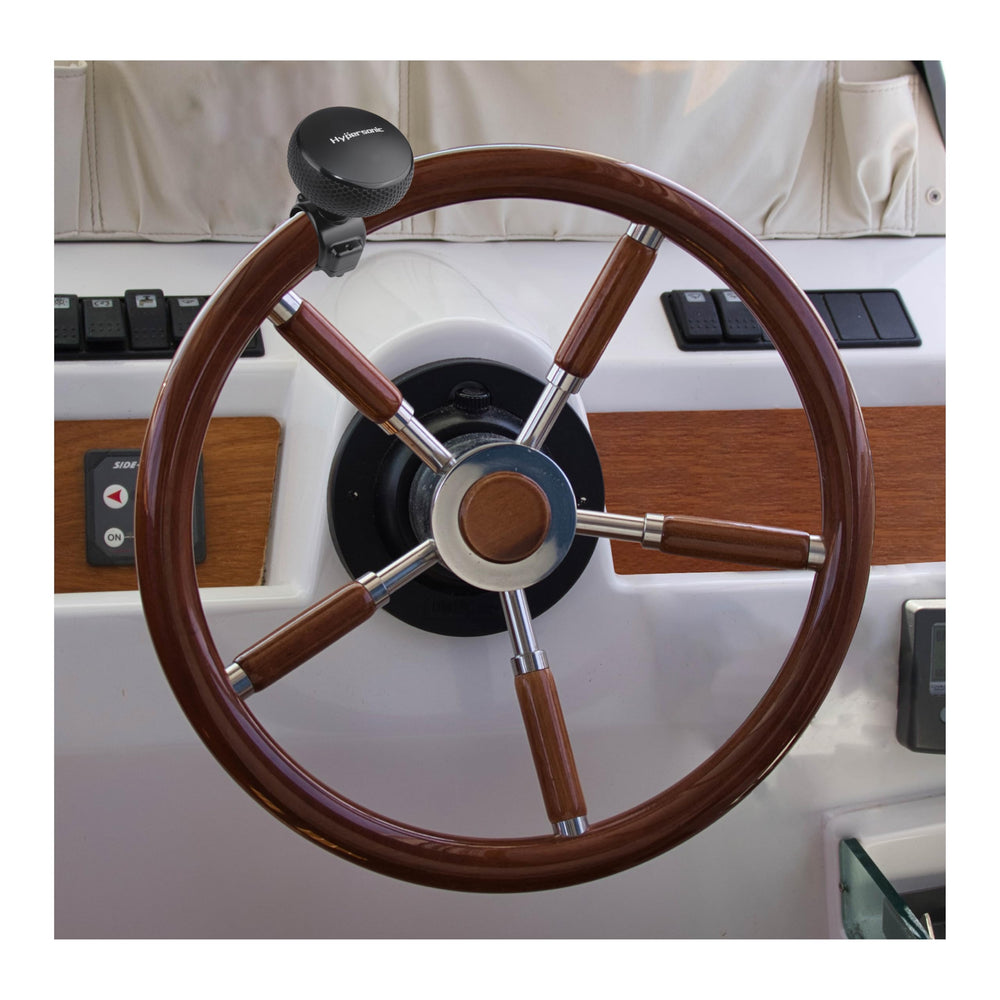 Close-up of Hypersonic large-cap steering knob for confident grip and leverage.