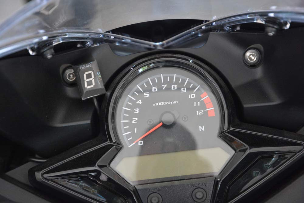 Idea gear indicator installation diagram illustrating dashboard placement on Honda bikes