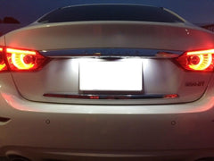 iJDMTOY Versa license plate light with steady white glow.