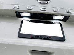 iJDMTOY xenon white LED license plate kit on Nissan Versa enhances plate illumination.