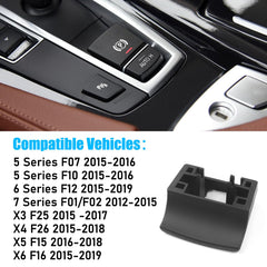 Jaronx parking brake cover installed on BMW dash for a clean look.