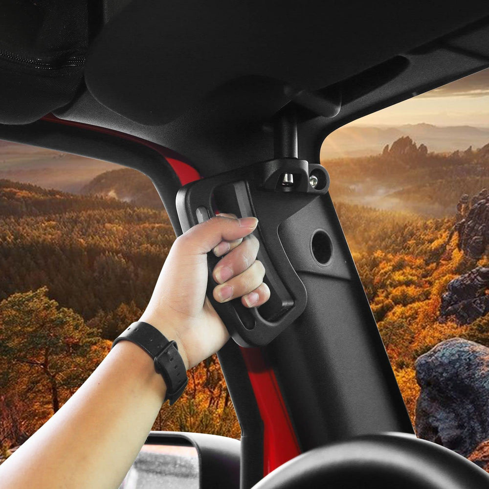 JeCar grab handles mounted on door frame provide sturdy hold while climbing.