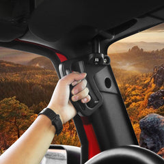 JeCar grab handles mounted on door frame provide sturdy hold while climbing.