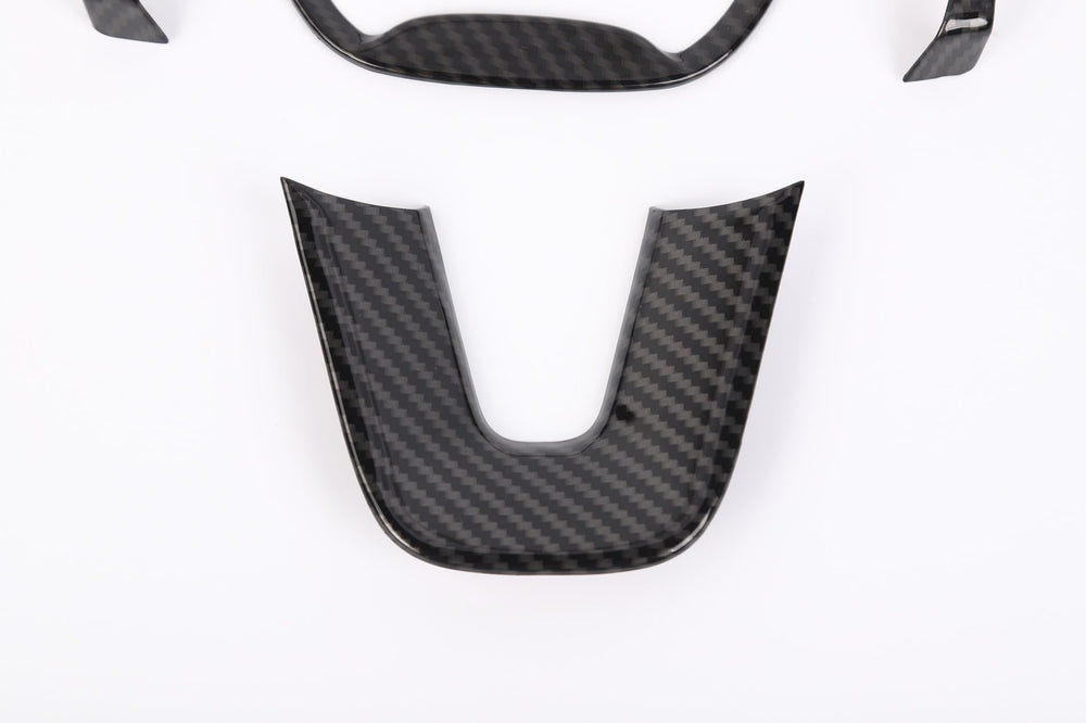 JeCar Challenger door trim carbon detail guards against scratches.