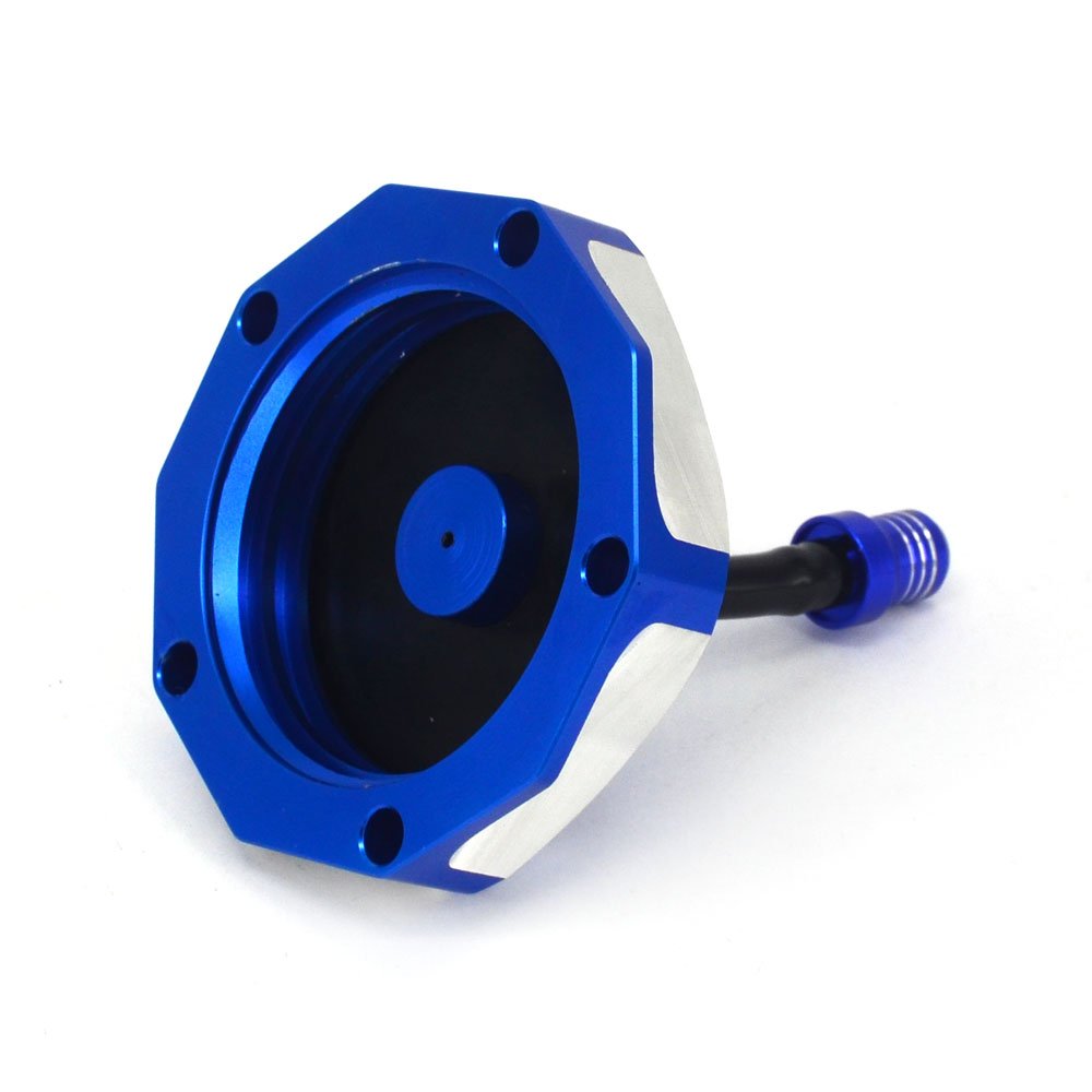 JFG RACING cap installed on a dirt bike for quick, tool-free mounting
