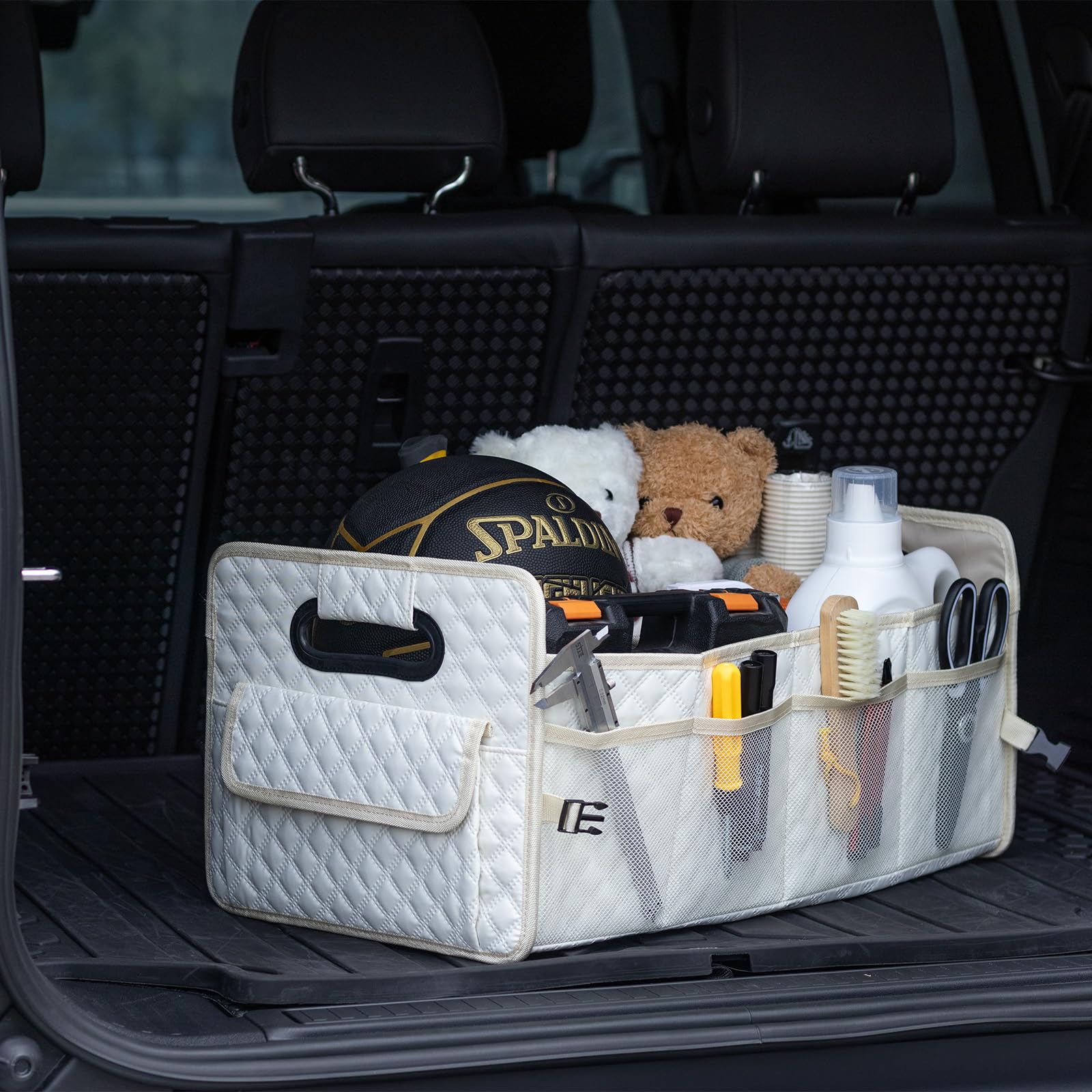 JiatuA trunk organizer with adjustable dividers keeps items secure during travel