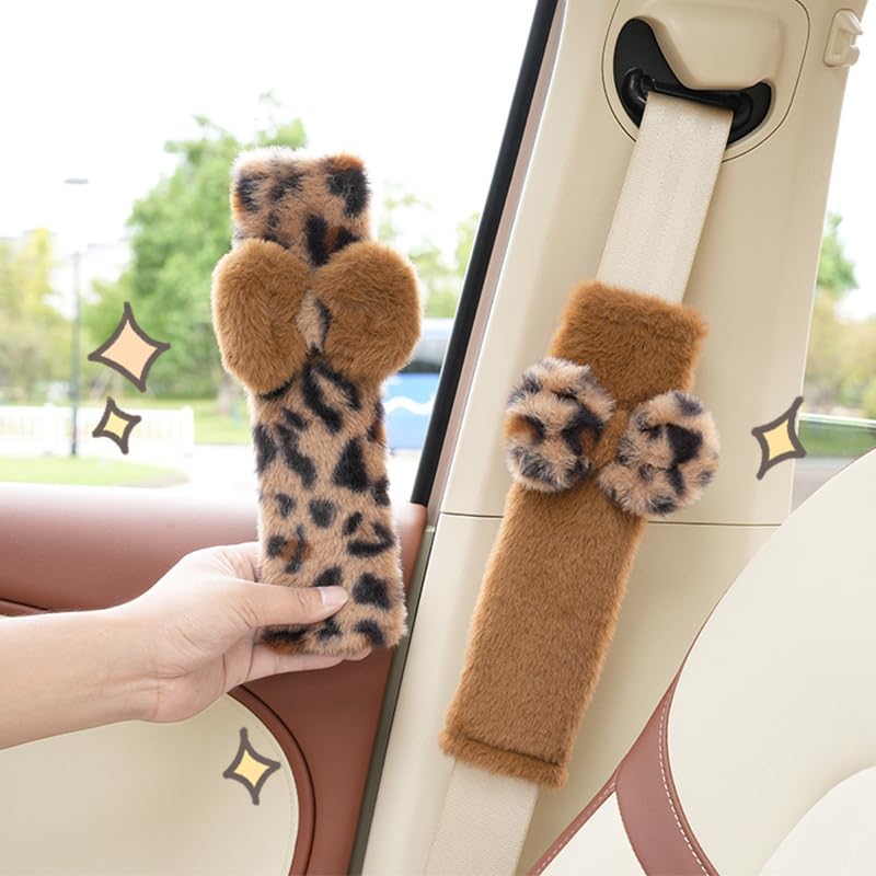 JINXU car interior leopard seatbelt pad adds stylish practicality.