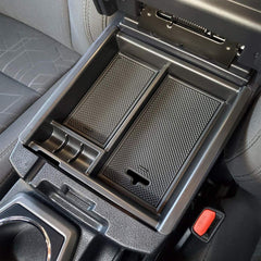 JKCOVER Tacoma center console tray in black trim provides organized storage