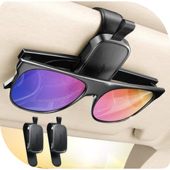 JOYROOM magnetic visor clip secures sunglasses on car visor.